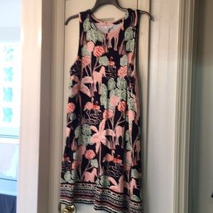 Navy tank dress with flamingo and plant print.